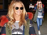 24 Oct 2015 - LONDON - UK
*** EXCLUSIVE ALL ROUND PICTURES ***
AUSSIE MODEL ELLE MACPHERSON SEEMS IN GREAT SPIRITS AS SHE FLIES INTO HEATHROW AIRPORT AFTER ATTENDING A LUXEPACK EVENT IN NICE!
BYLINE MUST READ : XPOSUREPHOTOS.COM
***UK CLIENTS - PICTURES CONTAINING CHILDREN PLEASE PIXELATE FACE PRIOR TO PUBLICATION ***
**UK CLIENTS MUST CALL PRIOR TO TV OR ONLINE USAGE PLEASE TELEPHONE 44 208 344 2007**