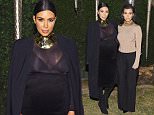 LOS ANGELES, CA - OCTOBER 23:  Kim Kardashian West and Kourtney Kardashian attend Olivier Rousteing & Beats Celebrate In Los Angeles at Private Residence on October 23, 2015 in Los Angeles, California.  (Photo by Stefanie Keenan/Getty Images for Apple)