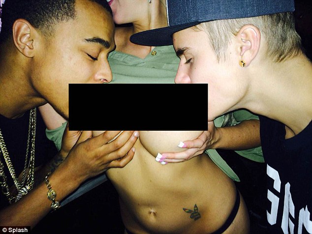 Identified: While Karolina was not identified in the original picture, which shows him and Khalil getting to grips with the dancer-turned-stripper