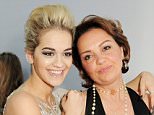 LONDON, ENGLAND - JUNE 04:  (EMBARGOED FOR PUBLICATION IN UK TABLOID NEWSPAPERS UNTIL 48 HOURS AFTER CREATE DATE AND TIME. MANDATORY CREDIT PHOTO BY DAVE M. BENETT/GETTY IMAGES REQUIRED)  Rita Ora (L) and mother Vera arrive at the Glamour Women of the Year Awards in association with Pandora at Berkeley Square Gardens on June 4, 2013 in London, England.  (Photo by Dave M. Benett/Getty Images for Pandora)