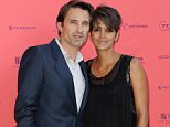 PARIS, FRANCE - JUNE 13:  (L-R) Olivier Martinez and Halle Berry attend the 'Toiles Enchantees' red carpet as part of The Champs Elysees Film Festival 2013 at Publicis Champs Elysees on June 13, 2013 in Paris, France.  (Photo by Kristy Sparow/Getty Images)