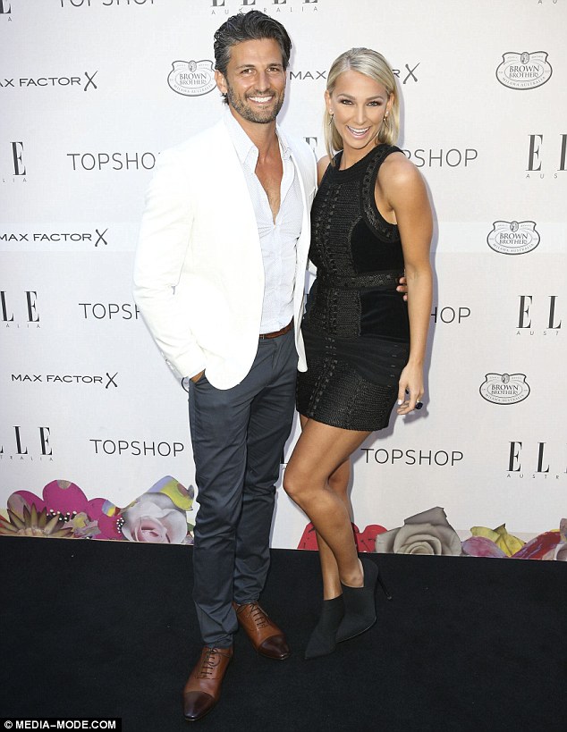 Joined at the hip: The Bachelor couple Tim Robards and Anna Heinrich made their presence felt at the annual event 