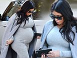 Picture Shows: Kim Kardashian  October 30, 2015\n \n Reality stars and sisters, Kim and Kourtney Kardashian spotted in Woodland Hills while getting ready to film. Kim is currently expecting her second child with husband Kanye West.\n \n Non Exclusive\n UK RIGHTS ONLY\n \n Pictures by : FameFlynet UK © 2015\n Tel : +44 (0)20 3551 5049\n Email : info@fameflynet.uk.com