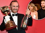 epa05008237 French DJ David Guetta poses for photos in the Mumm marquee in the Birdcage at Flemington Racecourse in Melbourne, Australia, 03 November 2015. The Melbourne Cup takes place on 03 November.  EPA/JULIAN SMITH AUSTRALIA AND NEW ZEALAND OUT