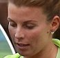 PREGNANT WAG COLEEN ROONEY WHO OVER THE WEEKEND RESPONDED TO TWITTER HATERS WHO WERE TARGETING HER HUSBAND WAYNE FOR HIS POOR PERFORMENCES FOR MANCHESTER UNITED. BY TWEETING HIS TWITTER ID AND ASKING THEM TO TWEET HIM AND NOT HER. SHE WAS SEEN AT THE YARD JUICE SHOP IN ALDERLEY EDGE CHESHIRE PICKING UP LUNCH. WHILE SHOWING OFF HER EVER GROWING BABY BUMP.\\n