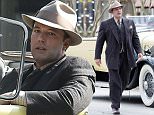 Picture Shows: Ben Affleck  November 02, 2015\n \n American actor Ben Affleck is spotted filming scenes for 'Live By Night' in Brunswick, Georgia. \n \n Ben is directing and acting in the new Prohibition era crime drama and was seen driving a classic car in full retro costume that included a beige fedora and a pinstripe suit.\n \n Non Exclusive\n UK RIGHTS ONLY\n \n Pictures by : FameFlynet UK © 2015\n Tel : +44 (0)20 3551 5049\n Email : info@fameflynet.uk.com