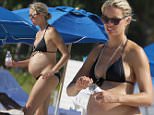 EXCLUSIVE: **PREMIUM EXCLUSIVE RATES APPLY** Supermodel Karolina Kurkova, 31, shows off her huge baby bump in a sexy black bikini at the beach in Miami Beach, FL. The Czech top model is 37 weeks pregnant as she expects her second child.\n\nPictured: Karolina Kurkova\nRef: SPL1166241  011115   EXCLUSIVE\nPicture by: Pichichi / Splash News\n\nSplash News and Pictures\nLos Angeles: 310-821-2666\nNew York: 212-619-2666\nLondon: 870-934-2666\nphotodesk@splashnews.com\n