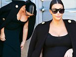 Kim Kardashian is spotted leaving the studio where the Kardashians shoot for their reality tv show. The pregnant mother of one keeps warm on a chilly Los Angeles day in a black naval-style overcoat and fitted dress, accentuating her chest. Thursday, November 5, 2015. X17online
