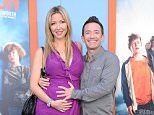 WESTWOOD, CA - JULY 27:  Actor David Faustino (R) and Lindsay Bronson arrive at the Premiere Of Warner Bros. 'Vacation' at Regency Village Theatre on July 27, 2015 in Westwood, California.  (Photo by Barry King/Getty Images)