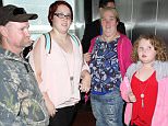 Mama June and Honey Boo Boo are seen at LAX in Los Angeles, California.\n\nPictured: Mama June, Honey Boo Boo\nRef: SPL1179932  181115  \nPicture by: GVK/Bauergriffin.com\n\n