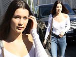 Beverly Hills, CA - Model Bella Hadid drops her car off at valet on her way into Il Pastaio to have lunch.  The brunette beauty when au natural today with no make up and no bra for the casual Friday outing.\nAKM-GSI         November 20, 2015\nTo License These Photos, Please Contact :\nSteve Ginsburg\n(310) 505-8447\n(323) 423-9397\nsteve@akmgsi.com\nsales@akmgsi.com\nor\nMaria Buda\n(917) 242-1505\nmbuda@akmgsi.com\nginsburgspalyinc@gmail.com