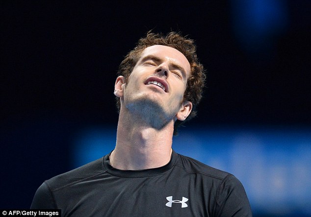 Andy Murray was eliminated from the ATP World Tour Finals as he lost to Stan Wawrinka on Friday