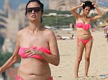 EXCLUSIVE: Chantelle Houghton seen on a beach in Majorca wearing an ill fitting bikini. It looks like yoyo dieter Chantelle has piled on the pounds again after earlier in the year losing 3 stone 
Photos taken on October 6th 2015

Ref: SPL1134067  201115   EXCLUSIVE
Picture by: Splash News

Splash News and Pictures
Los Angeles: 310-821-2666
New York: 212-619-2666
London: 870-934-2666
photodesk@splashnews.com