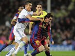 Barcelona's Argentinian forward Lionel Messi (R) vies for the ball with Real Madrid's Portuguese forward Cristiano Ronaldo during the Spanish league "clasico" football match FC Barcelona vs Real Madrid on November 29, 2010 at Camp Nou stadium in Barcelona. Barcelona won 5-0.   AFP PHOTO/ JOSEP LAGO (Photo credit should read JOSEP LAGO/AFP/Getty Images)