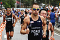 Defense.gov News Photo 110724-D-BC253-640 - U.S. Coast Guard Petty Officer 2nd Class Bradley Pigage competitor number 100 races in the triathlon event at the 5th International Military.jpg