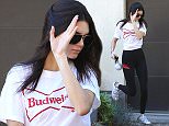 UK CLIENTS MUST CREDIT: AKM-GSI ONLY
EXCLUSIVE: Beverly Hills, CA - Kendall Jenner is barefaced in Beverly Hills as she visits a residence. The international model wore black leggings and a Budweiser T-Shirt with Adidas Sneakers. Kendall turns 21 next November. She carried a cute pom pom key ring accessory as she walked back to her SUV.

Pictured: Kendall Jenner
Ref: SPL1180748  181115   EXCLUSIVE
Picture by: AKM-GSI / Splash News