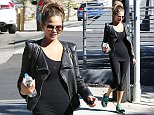 UK CLIENTS MUST CREDIT: AKM-GSI ONLY
EXCLUSIVE: Los Angeles, CA - Supermodel Chrissy Teigen gets an early start on her day and visits her gym to keep up with her workout routine despite being pregnant with her first child. Chrissy sported an all black look to keep her tiny baby bump under wraps and rocked a cool rocker biker jacket.