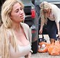 Left carrying the bags... and the baby! Pregnant Chantelle Houghton struggles with shopping as errant fiancé Alex Reid is nowhere to be seen