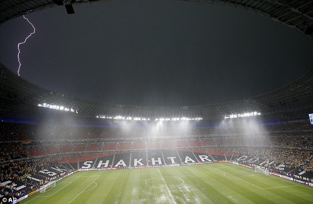 Storm: Lightning strikes the Donbass Arena as thousands of fans escape for shelter