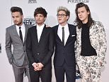 Liam Payne, from left, Louis Tomlinson, Niall Horan, and Harry Styles of One Direction arrive at the American Music Awards at the Microsoft Theater on Sunday, Nov. 22, 2015, in Los Angeles. (Photo by Jordan Strauss/Invision/AP)