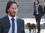 Picture Shows: Keanu Reeves  November 23, 2015\n \n A beat-up, bruised and bloody Keanu Reeves walk alongside a pitbull on the set of 'John Wick 2', which is currently filming in Manhattan's Central Park in New York City, New York.\n \n Keanu, dressed in a suit, was also seen being followed by an actor dressed in an intimidating mime costume while filming the scene.\n \n Non Exclusive\n UK RIGHTS ONLY\n \n Pictures by : FameFlynet UK © 2015\n Tel : +44 (0)20 3551 5049\n Email : info@fameflynet.uk.com