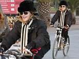 **ALL ROUND PICTURES FROM SOLARPIX.COM**
**SOLARPIX RIGHTS-WORLDWIDE SYNDICATION** 
** NO SYNDICATION IN SPAIN**                                                                                 
Caption:
Pop Queen Madonna seen taking a quick Bike ride with her security and entourage before her concert toning in Barcelona Spain
This pic:Madonna
**NO ONLINE USAGE WITHOUT PRIOR AGREEMENT**
JOB REF:18832       BJG  DATE:23.11.15
**MUST CREDIT SOLARPIX.COM AS CONDITION OF PUBLICATION**
**CALL US ON: +34 952 811 768**