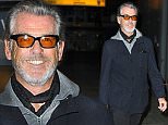 23.NOVEMBER.2015 - LONDON - UK\n*** EXCLUSIVE PICTURES ***\nFORMER JAMES BOND ACTOR PIERCE BROSNAN ARRIVES AT HEATHROW AIRPORT IN WEST LONDON COMING FROM LOS ANGELES. PIERCE WAS DRESSED CASUAL SPORTING A GREY  BEARD AS HE STROLLED THROUGH THE AIRPORT.\nBYLINE MUST READ : XPOSUREPHOTOS.COM\n***UK CLIENTS - PICTURES CONTAINING CHILDREN PLEASE PIXELATE FACE PRIOR TO PUBLICATION***\nUK CLIENTS MUST CALL PRIOR TO TV OR ONLINE USAGE PLEASE TELEPHONE 0208 344 2007