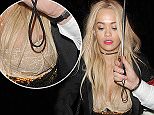 Rita Ora leaving China Tang restaurant in the pouring rain, following her stylist Kyle Devolle's birthday. Rita's nipples were exposed as she left the venue
Featuring: Rita Ora
Where: London, United Kingdom
When: 01 Dec 2015
Credit: Will Alexander/WENN.com
