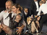 Graham Norton makes a surprise appearance on stage with Madonna during her concert at the O2 Arena in London

Pictured: Graham Norton and Madonna
Ref: SPL1187470  011215  
Picture by: Splash News

Splash News and Pictures
Los Angeles: 310-821-2666
New York: 212-619-2666
London: 870-934-2666
photodesk@splashnews.com