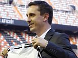 Former Manchester United and England defender Gary Neville poses to the photographers in the Mestalla stadium after a press conference in Valencia, Spain, Thursday, Dec. 3, 2015. Gary Neville has been appointed as coach of Spanish league club Valencia for the rest of this season after Nuno Espirito Santo left by mutual agreement. Valencia is owned by Peter Lim, who holds a stake in English non-league team Salford City alongside the Nevilles and other former Manchester United players. (AP Photo/Alberto Saiz)