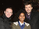 MANCHESTER, ENGLAND - DECEMBER 02:  (EXCLUSIVE COVERAGE) Wayne Rooney and Michael Carrick of Manchester United, with Winta Abreha - a child from a local school in association with the Manchester United Foundation - switch on the Christmas tree lights at Old Trafford on December 2, 2015 in Manchester, England.  (Photo by John Peters/Man Utd via Getty Images)