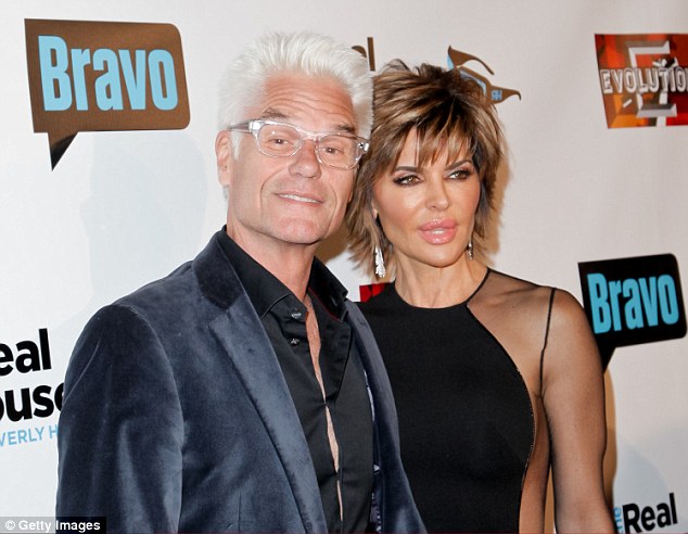 Hot couple: Hollywood siren Lisa Rinna, 52, kept her look sultry and chic in a sheer panelled black dress as she arrived on the red carpet with her hubby Harry Hamlin