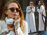 EXCLUSIVE TO INF.\nDecember 8, 2015: Mary-Kate Olsen and twin sister Ashley Olsen are spotted wearing matching long white coats while taking a smoke break together this morning in New York City. This is the first time Mary-Kate, 29, has been photographed since she married her longtime boyfriend, French banker Olivier Sarkozy, 46, on November 27th. She is seen wearing a delicate gold band on her ring finger.\nMandatory Credit: Elder Ordonez/INFphoto.com  Ref: infusny-160