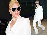 December 10, 2015: Lady Gaga is spotted at JFK airport in New York City. Mandatory Credit: PapJuice/INFphoto.com Ref: infusny-286
