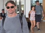 Hugh Jackman was all smiles as he departed Adelaide on a Sunday afternoon. Hugh waved to waiting fans as he made his way through the airport with daughter Ava. \nHugh currently in Australia for his "Broadway to Oz" shows. He played 3 sold out nights in Adelaide and now plays perth in 2 days. \n