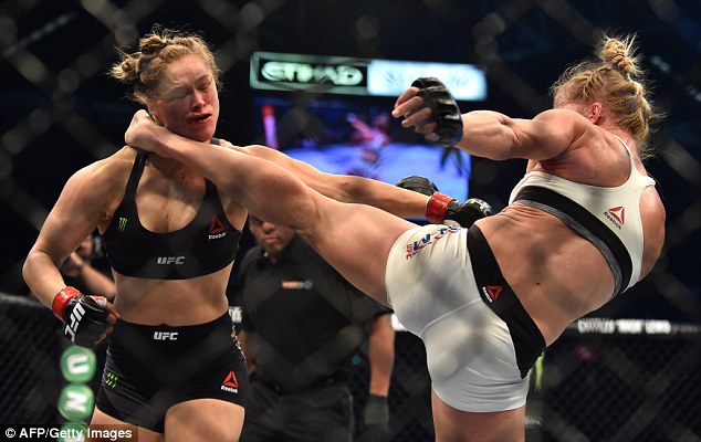 Devastating loss: Ronda was knocked out with a powerful kick to the head by Holly in their big match-up in November and the former champion was left hospitalized