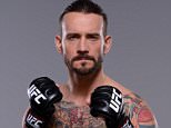 DALLAS, TX - MARCH 13:  Phil "CM Punk" Brooks poses for a photo during a UFC photo session at the Hilton Anatole Hotel on March 13, 2015 in Dallas, Texas. (Photo by Mike Roach/Zuffa LLC/Zuffa LLC via Getty Images)
