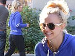 Britney Spears heads to dance class in Calabasas with a big smile on her face and her hair held up in a high ponytail. Saturday, December 12, 2015. X17online