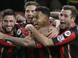 Bournemouthís Joshua King, centre, celebrates after scoring a goal during the English Premier League soccer match between Bournemouth and Manchester United at the Vitality Stadium in Bournemouth, England, Saturday Dec. 12, 2015. (AP Photo/Tim Ireland)
