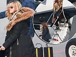 EXCLUSIVE: Madonna with family and entourage arrives at the Zurich airport in Switzerland\n\nRef: SPL1185400  121215   EXCLUSIVE\nPicture by: Splash News\n\nSplash News and Pictures\nLos Angeles: 310-821-2666\nNew York: 212-619-2666\nLondon: 870-934-2666\nphotodesk@splashnews.com\n