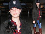 LOS ANGELES, CA - DECEMBER 13: Lana Del Rey is seen at LAX on December 13, 2015 in Los Angeles, California.  (Photo by GVK/Bauer-Griffin/GC Images)