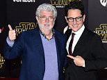 HOLLYWOOD, CA - DECEMBER 14:  Filmmaker George Lucas (L) and writer-director J.J. Abrams attend the Premiere of Walt Disney Pictures and Lucasfilm's "Star Wars: The Force Awakens" on December 14, 2015 in Hollywood, California.  (Photo by Ethan Miller/Getty Images)