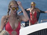 20 December 2015.\nSaint Barthelemy, FRANCE - Paris Hilton wearing in a red swimsuit on a yacht in Saint Barthelemy.\nCredit: GoffPhotos.com   Ref: KGC-149/32683\n**UK Sales Only**
