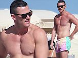 Luke Evans, 36, shirtless at the beach with his male friend in Miami Beach, FL. The Welsh actor enjoyed a morning swim in the ocean during his Florida holiday.\n\nPictured: Luke Evans\nRef: SPL1198964  211215  \nPicture by: Pichichi / Splash News\n\nSplash News and Pictures\nLos Angeles: 310-821-2666\nNew York: 212-619-2666\nLondon: 870-934-2666\nphotodesk@splashnews.com\n