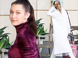 Los Angeles, CA - Pretty sisters Gigi and Bella Hadid return to The Carlyle Residences after hitting a few retail stores and wrapping up their Christmas shopping. Bella was kind and shared a pretty smile at our shutterbug, but her sister was not felling joyful today and kept it to herself.\nAKM-GSI         December 23, 2015\nTo License These Photos, Please Contact :\nSteve Ginsburg\n(310) 505-8447\n(323) 423-9397\nsteve@akmgsi.com\nsales@akmgsi.com\nor\nMaria Buda\n(917) 242-1505\nmbuda@akmgsi.com\nginsburgspalyinc@gmail.com