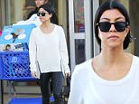 Calabasas, CA - Kourtney Kardashian is one busy mom, today the mother-of-three made another trip to Toys "R" Us in the Calabasas area. She wore a white sweater, and black leather trousers matching her booties and Givenchy tote.\nAKM-GSI         December 23, 2015\nTo License These Photos, Please Contact :\nSteve Ginsburg\n(310) 505-8447\n(323) 423-9397\nsteve@akmgsi.com\nsales@akmgsi.com\nor\nMaria Buda\n(917) 242-1505\nmbuda@akmgsi.com\nginsburgspalyinc@gmail.com