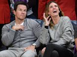 LOS ANGELES, CA - DECEMBER 23:  Mark Wahlberg (L) and Rhea Durham attend a basketball game between the Oklahoma City Thunder and the Los Angeles Lakers at Staples Center on December 23, 2015 in Los Angeles, California.  (Photo by Noel Vasquez/GC Images)