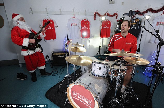 The former Chelsea man was joined by a guitar player dressed as Father Christmas in the YouTube video