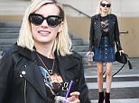 UK CLIENTS MUST CREDIT: AKM-GSI ONLY\nEXCLUSIVE: **SHOT ON 12/24/15** Beverly Hills, CA - Young Hollywood star Emma Roberts stops by Olive & June Nail Spa looking cute as usual, wearing a black leather jacket over a black graphic tee, a denim skirt showing her legs and stylish purple suede booties.\n\nPictured: Emma Roberts\nRef: SPL1200842  251215   EXCLUSIVE\nPicture by: AKM-GSI / Splash News\n\n