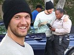 **EXCLUSIVE**  Date: December 26th 2015       Photo Credit: MOVI Inc. \n'Magic Mike' star Alex Pettyfer turns on the charm with a parking enforcement officer in West Hollywood,Ca but to no avail. The British actor returned to his flash BMW to see a warden already printing out a ticket for the illegally parked vehicle, rather than lose his temper Pettyfer raised a smile and even gave the officer a hug before excepting the ticket!